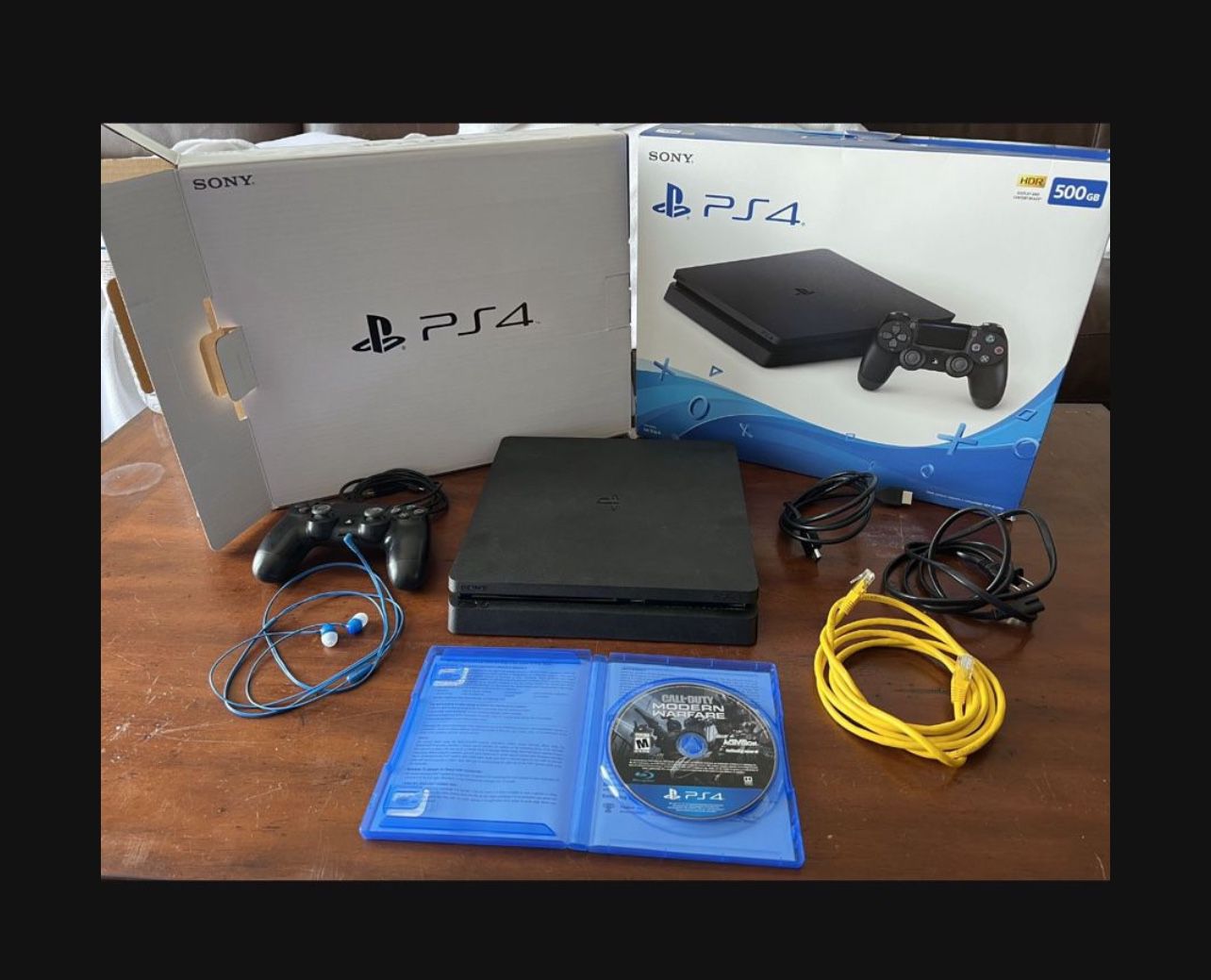 PlayStation 4 Slim Black 500GB + Remote + COD MW Game + Sony Headphones 