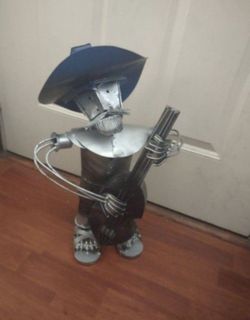 Very cool art deco mariachi metal man