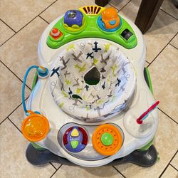 Storkcraft 3-in-1 Activity Walker and Rocker with Jumping Board and Feeding Tray - Green