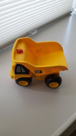 Boys cat truck/motor runs