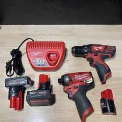 M12 Drill Combo Kit. Three Batteries. Impact And Drill And Charger
