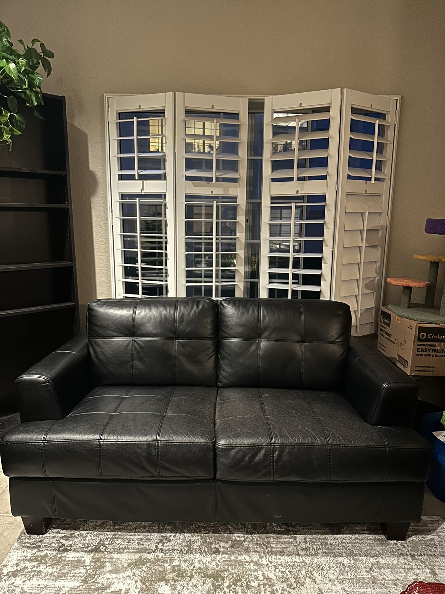 Black Leather Couch - 2 Large Seats