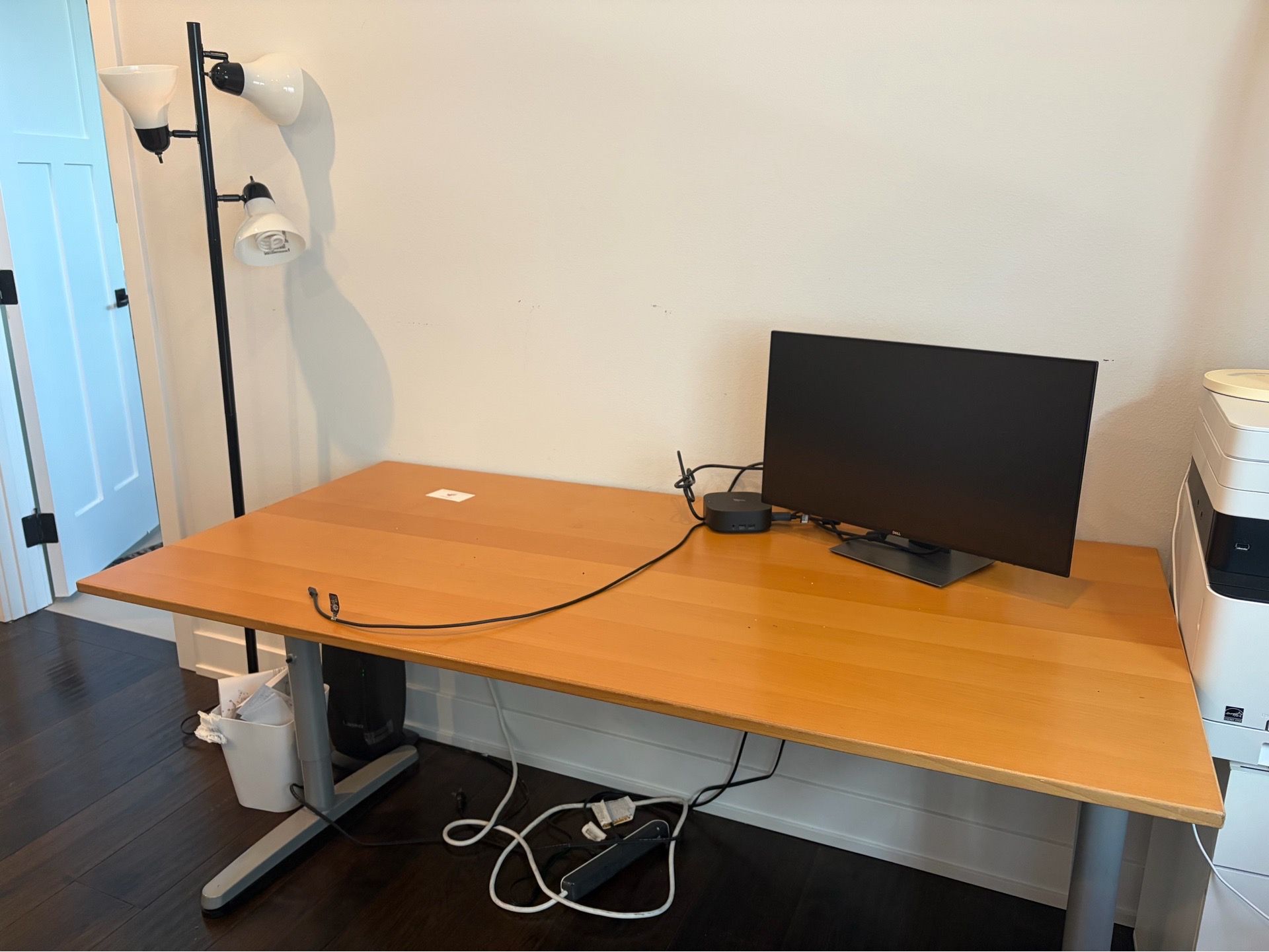 office desk with standing lamp