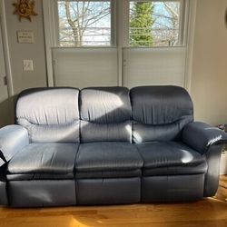 Lazyboy Sofa With A Table In The Middle