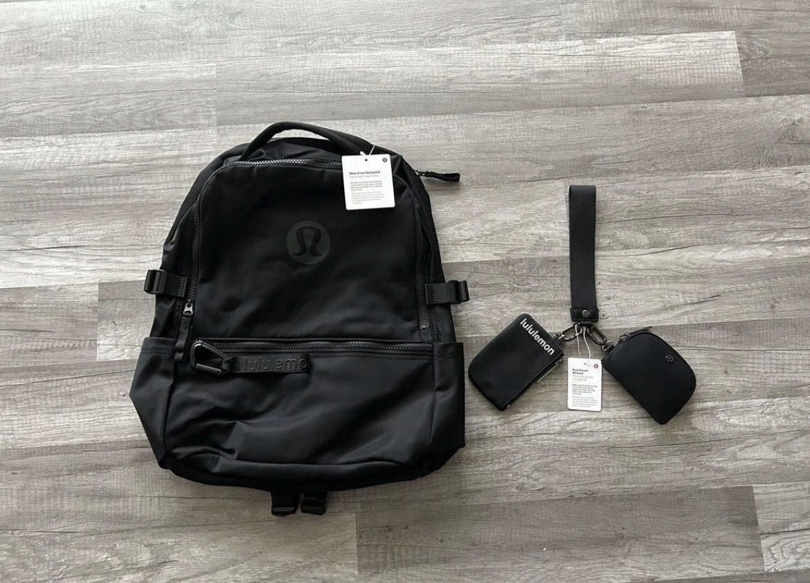 black Lululemon backpack and keychain