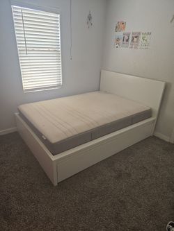 Full size bed frame with pull out drawers