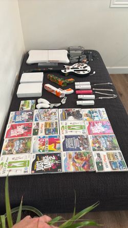 Huge Nintendo Wii Bundle – 2 Consoles, 5 Controllers, 18 Games, Guitar Hero & More