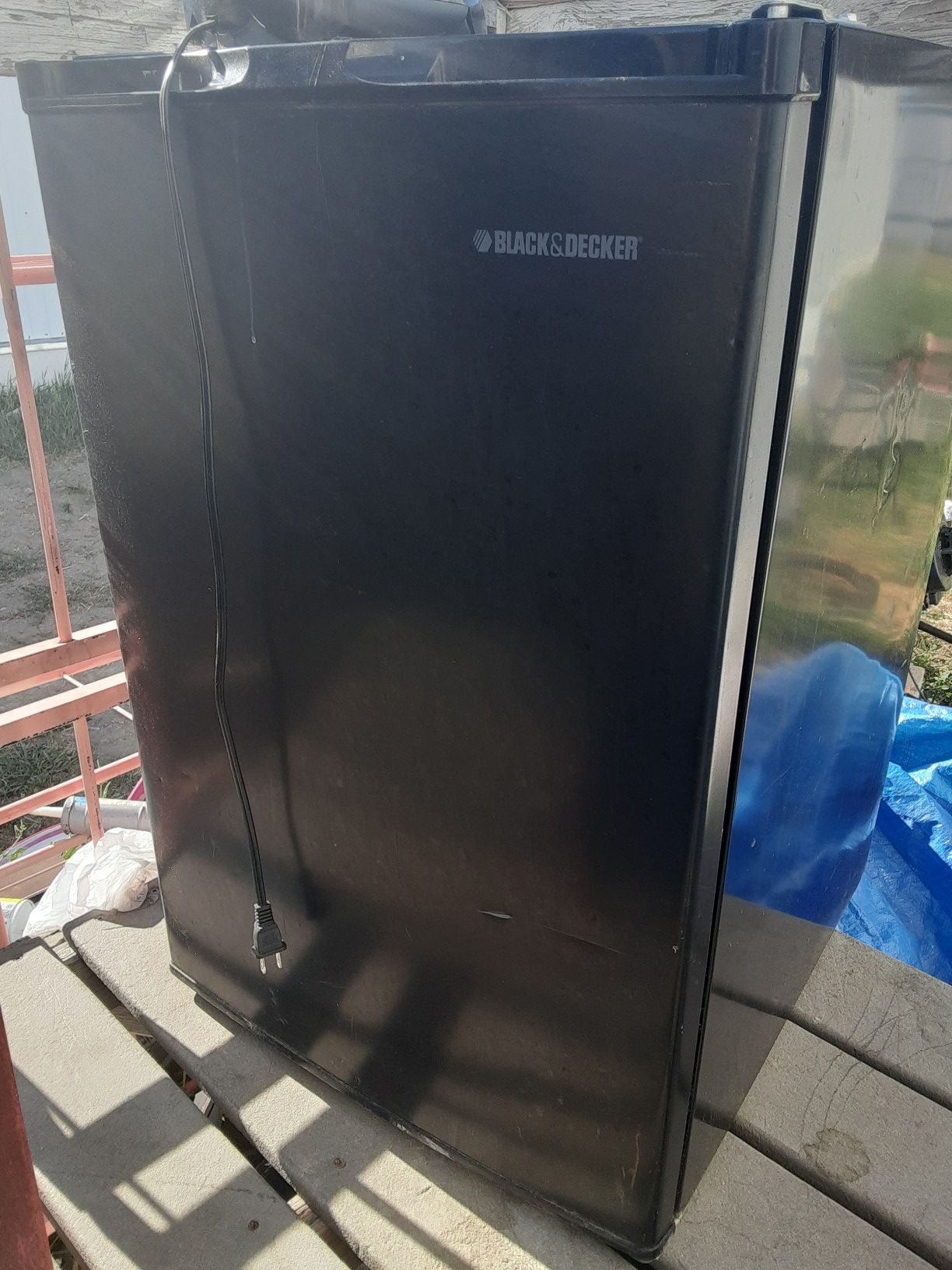 Mini fridge (black and Decker), AC UNIT (window unit), microwave (emerson)