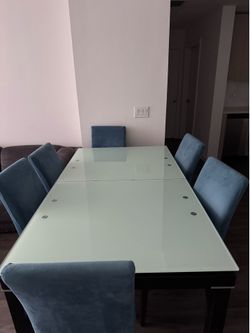 Glass Rectangle Dining Table with matching buffet