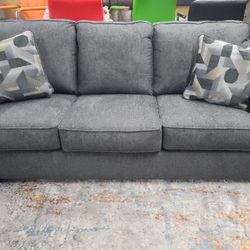 Ashley sectional with accent pillows