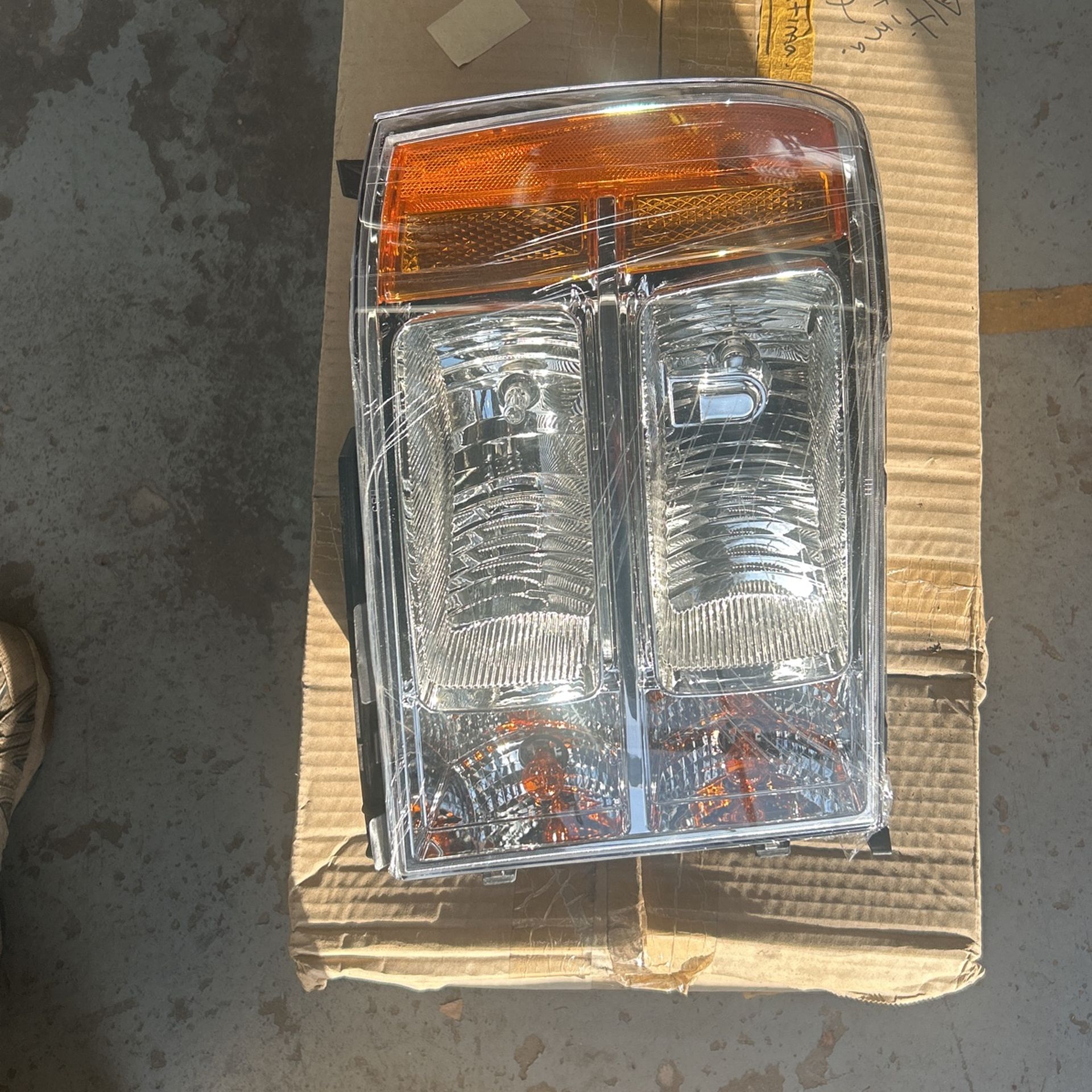 GMC Sierra Headlight