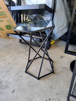 Small black glass side table good condition