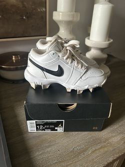 Jordan 1 low kids multi sport cleat size 12c