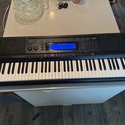 Casio WK-500 w/power cord, 2 seats and stand