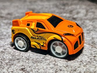 This Item Is A 2017- Hot Wheels Micro-Mini Pull-Back Racer In Orange  •
Type : Small Die-Cast With Some Plastic Parts.
Size : Approximately-1-1/3"-L