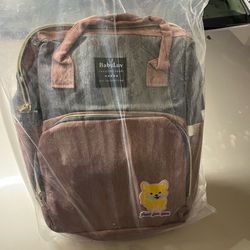 Diaper bag/ changing station backpack tote- Brand new