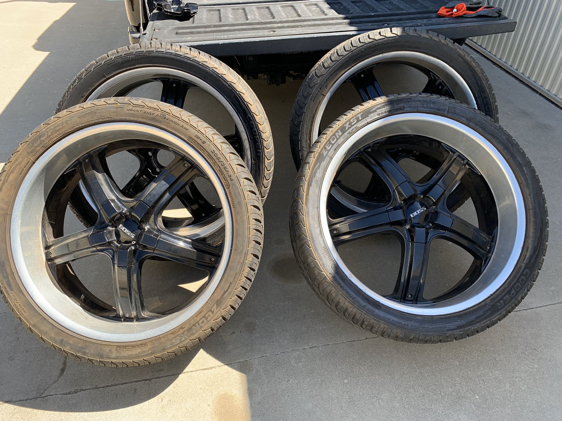 24” Boss wheels with Cooper tires