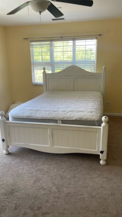 Shabby white wooden queen bed