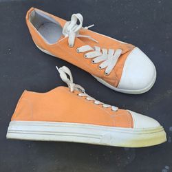 Orange Canvas Sneakers with White Accents with stains