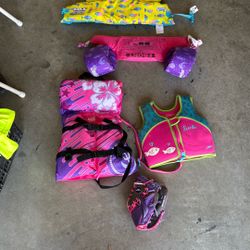 Child Lifesavers And A Baseball Glove