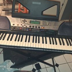 Yamaha psr340 stand power supply and synthesizer