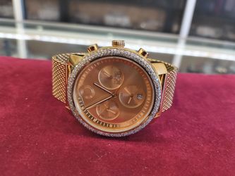Movado Bold watch with diamond on it layway available 10%dwon if you interested please make sure you ask for Maribel thank you