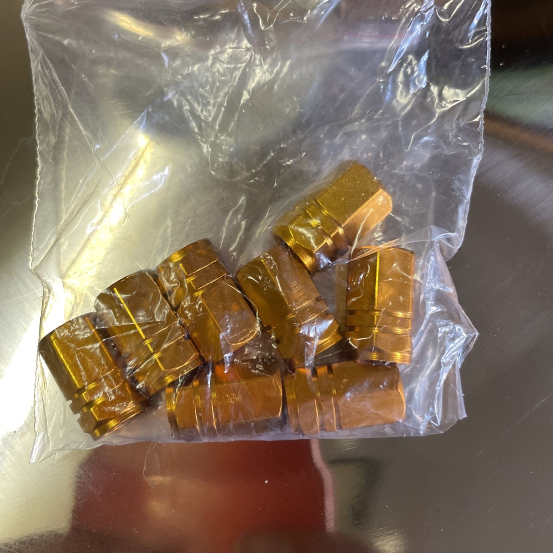 Package Of 8 Anodized Gold Tire Valve Stem Covers