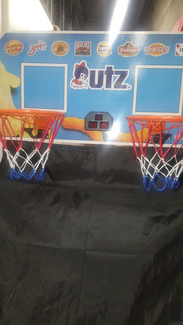 Brand new in the box utz basketball hoop comes with 4 basketballs infant.
