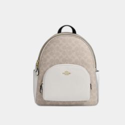 Gold/sand Coach back pack