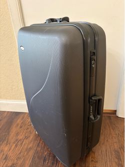 Luggage LARGE 32x12x20”. 4 wheels. - wheels are good but top robber is pealing.