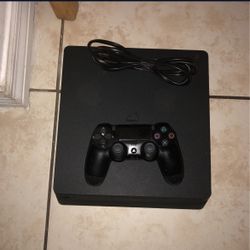 ps4 with Power Cord and controller