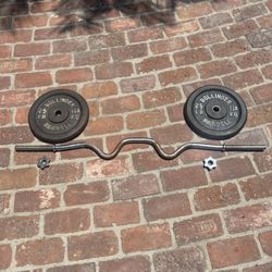 Olympic arm curl bar With 2 ( 25 Lbs ) Plates