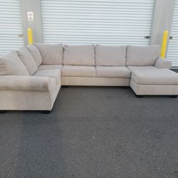Large Ashley Furniture 3 Piece Sectional Sofa. Tan In Color