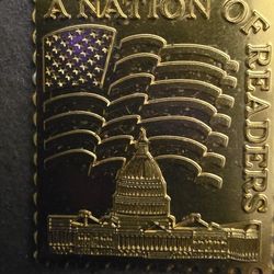 A Nation of Readers Gold Metal Stamp
