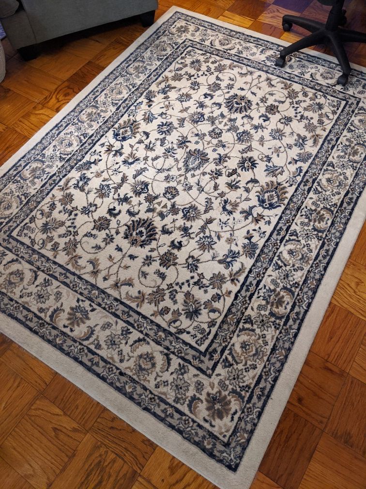 5.5 ft x 7.5 ft area rug