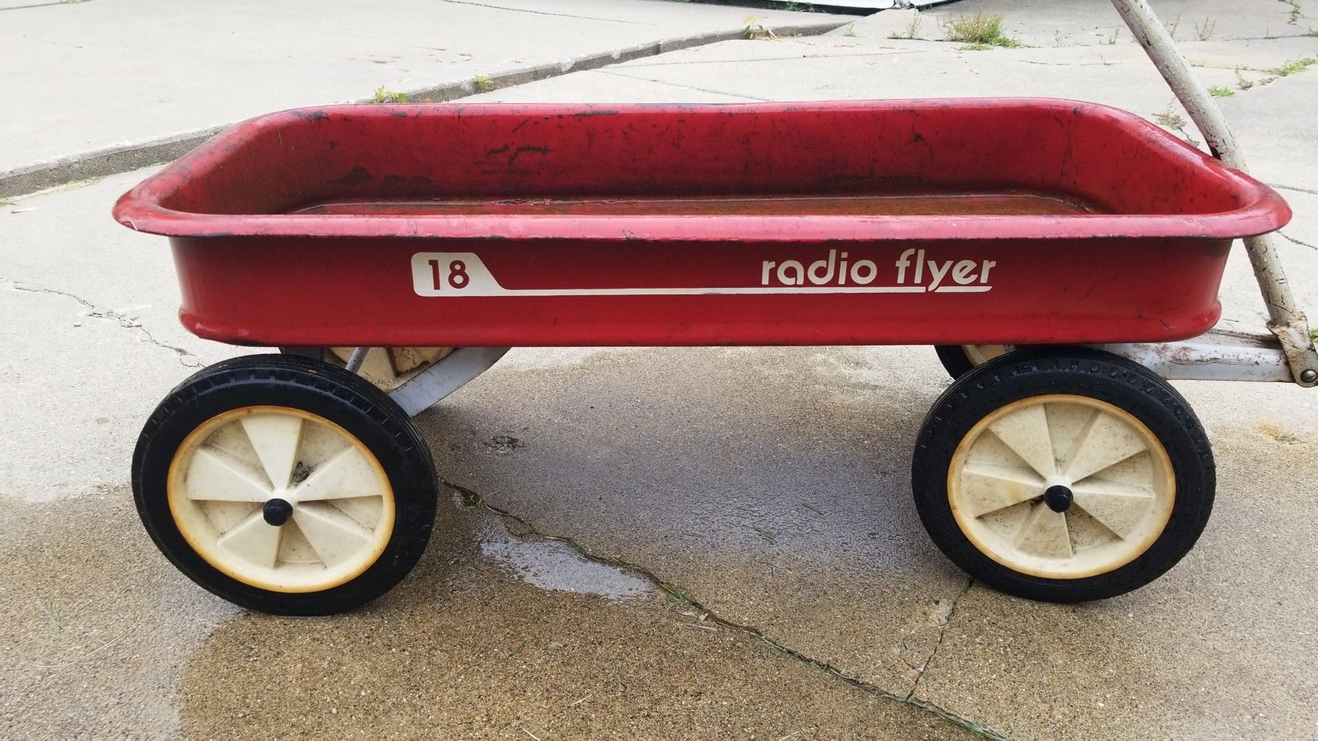Vintage metal radio flyer 18 wagon.
