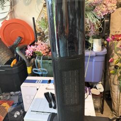 Faux fireplace oscillating space heater
