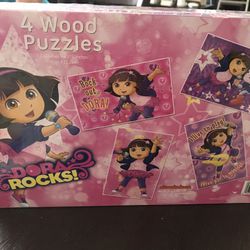 “Dora Rocks!” 4 Wood Puzzles - 24 Pieces Each