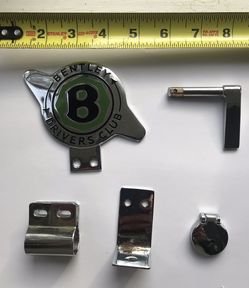 Vintage Bentley automobile badge, other accessories