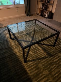 Glass coffee table