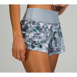 Lululemon Speed Up Mid Rise Shorts 4" Inseam Kaleidofloral Multi/Blue Cast Sz 4 zippered back pocket size 4 Speed up shorts