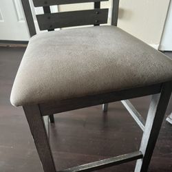 Table And (4) 24” Stool Chairs. 
