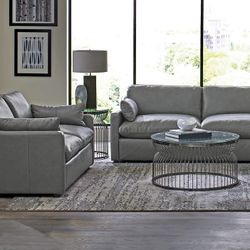 Brand New Top Grain Leather Gray Sofa And Loveseat.  CLOSEOUT Deal.  Was Over $4000. Brand New 