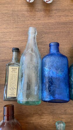 Antique Embossed Glass Bottle Collection
