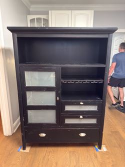 Dining cabinet with wine glass holder
