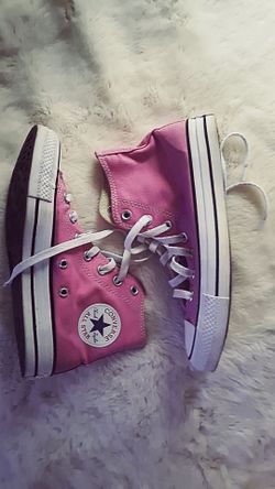 Pink low-top converse