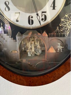 Rhythm musical clock