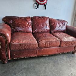 Red Leather Hide-a-Bed Sofa – Classic & Comfortable $300 OBO
