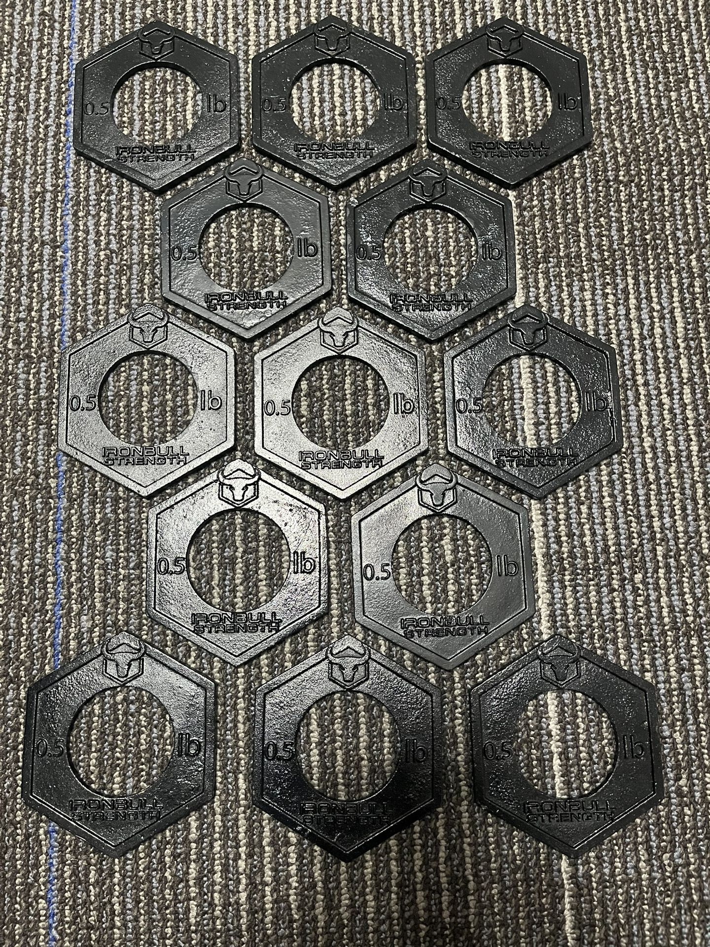 1/2 Pound Iron Bull Strength Weight Plates Olympic Style