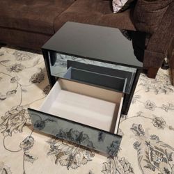 Brand new out of the box black mirrored nightstand. (Retails for $389).